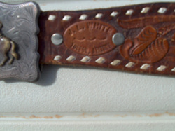   J.L. White, saddle maker mark