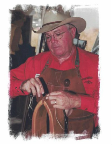 Mike Brennan sewing on a stitching horse.