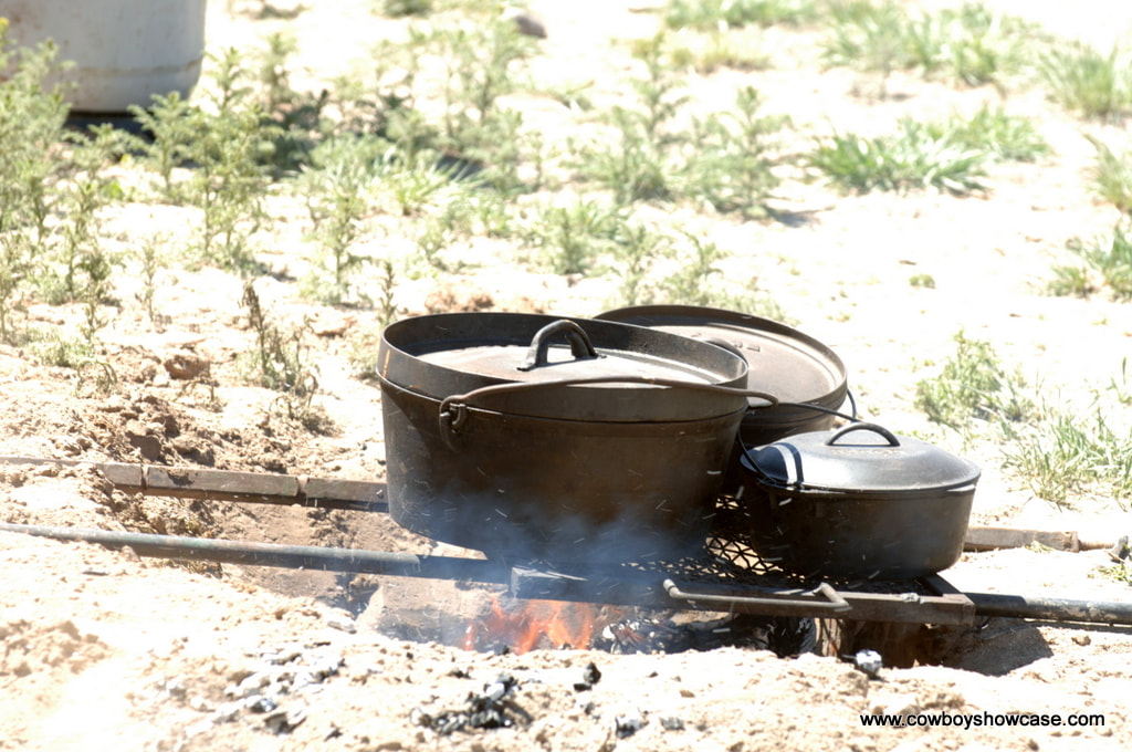 Dutch ovens on the fire.